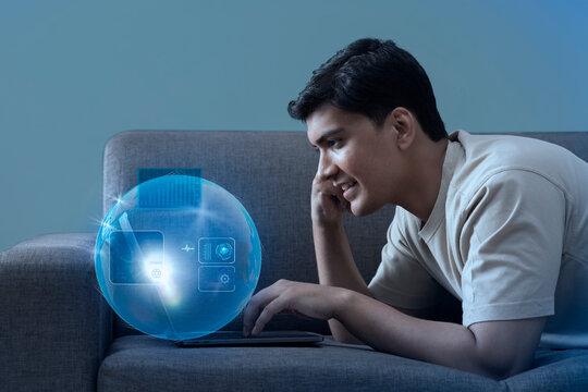 Man uses laptop on virtual visual screen