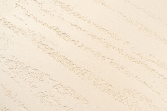 Travertine Effect Decorative Plaster Wall Texture with Diagonal Vein Pattern in Beige