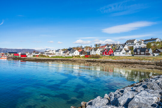 Beautiful fjord with colorful houses in Bronnoysund in Norway during a sunny day on the coast of Scandinavia