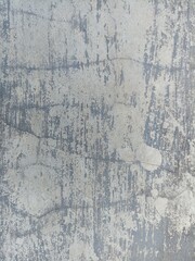 Fototapeta premium Gray concrete wall texture with rough stone pattern, ideal for website backgrounds, posters, presentations, mockups, and digital graphic design.