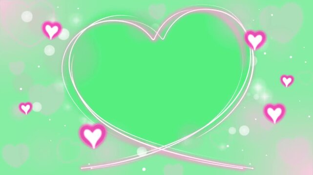 Animation pink heart shape frame on green background.
