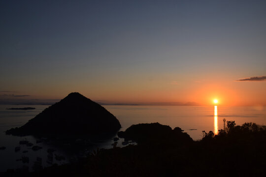 The natural beauty of sunset from Sylvia Hill, Labuan Bajo, East Nusa Tenggara, Indonesia, beautiful view, sunset from the edge of the sea