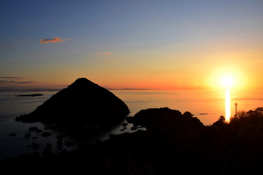 The natural beauty of sunset from Sylvia Hill, Labuan Bajo, East Nusa Tenggara, Indonesia, beautiful view, sunset from the edge of the sea