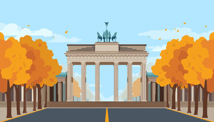 Brandenburg Gate in Berlin, Germany, during autumn with colorful trees and falling leaves. © Note