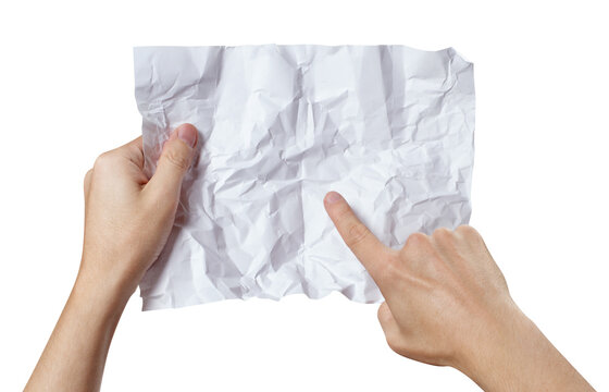 Hands holding blank crumpled paper with pointing finger, isolated on transparent cutout background