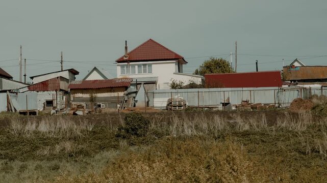 A typical Eastern European village in the countryside with its houses and buildings.
