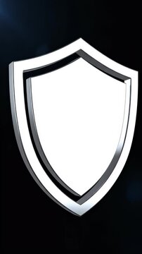 A polished chrome shield emblem with a bright white inner surface on a dark background