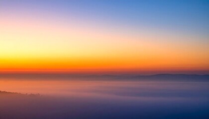Obraz premium Vibrant Sunset or Sunrise Over Ocean Horizon with Gradient Sky Colors.