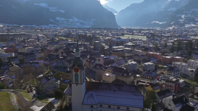 City of Altdorf in Canton Uri, Switzerland. Town Hall Square with historic houses on sunny Winter day. Aerial Drone Shot