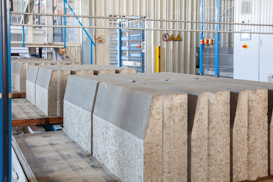 Precast Concrete Curbstones on Production Line in Industrial Factory, Manufacturing Process for Construction Materials