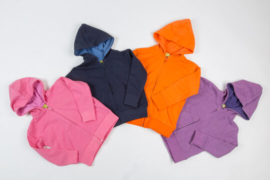 Collection of Colorful Kids Zip-Up Hoodies. Children's Casual Hooded Sweatshirts on White for Fashion Retail