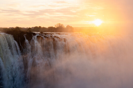 sunrise over Victoria Falls from the Zimbabwe, Africa side