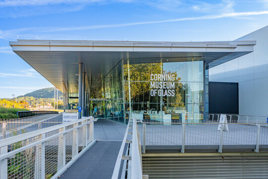Corning, NY, US-September 20, 2025: Entrance to the Corning Museum of Glass near downtown and the historic Gaffer District on Market Street.
