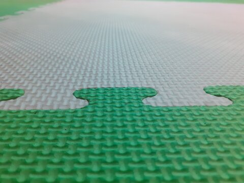 Close Up of Foam Puzzle Mat Surface Texture for Children's Play Area