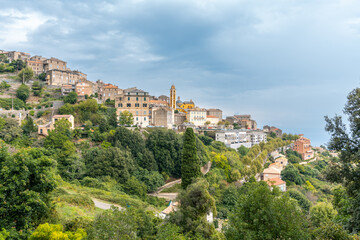 Fototapeta premium Cervione village clinging to hillside in Corsica France