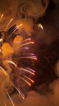 Vertical video: First shell bursting, firework bursts and smoke filling night sky, sparks fading