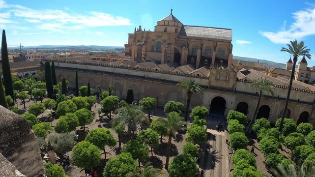 Cordoba, Spain - April 18, 2026: Gate of the Mezquita (Mosque-cathedral) of Cordoba, Spain in a sunny day.