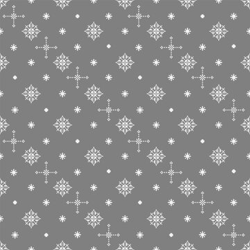Seamless white pixel folk geometric pattern on a grey background featuring traditional floral and cross motifs. Ideal for fabric, wallpaper, wrapping paper, stationery, and surface design.