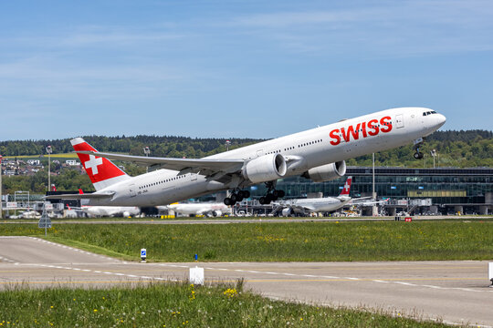 Swiss Boeing 777-300ER airplane at Zurich airport in Switzerland