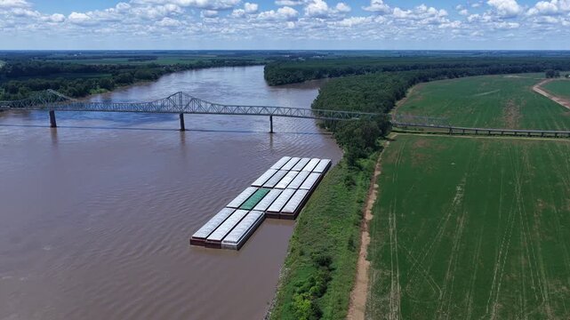 Mississippi River with iron bridge and barges at Mississippi, Ohio River Confluence