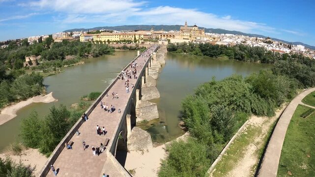 Cordoba, Spain - April 18, 2026: historic buildings in the city center of Cordoba in Spain, in this case roman bridge
