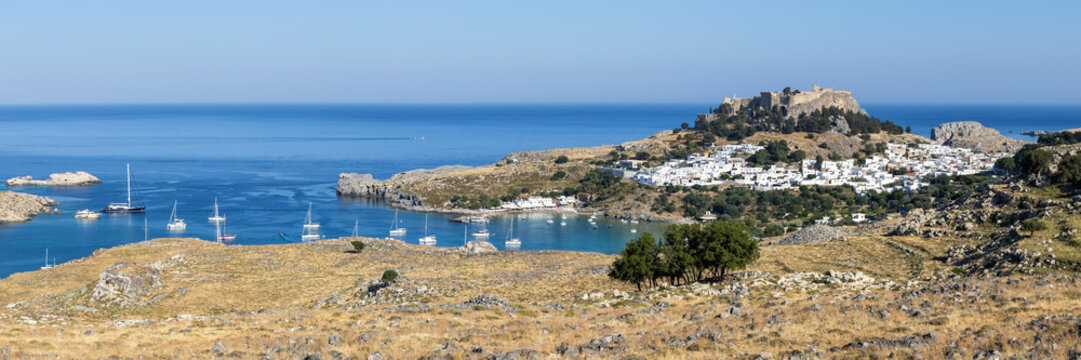 Rhodes island with acropolis of Lindos town vacation at the Aegean Sea panorama on Rhodes, Greece