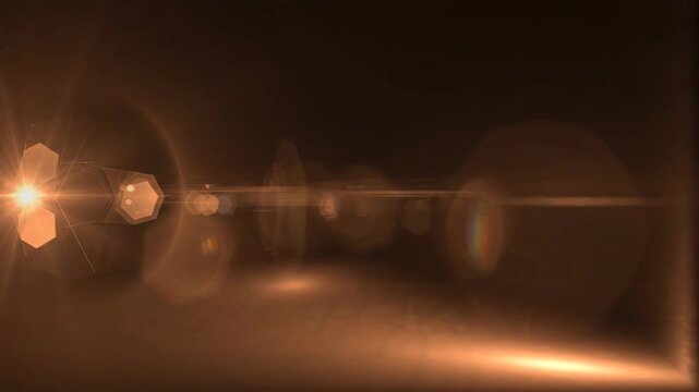 Nighttime Road Scene with Headlights and Light Flare Effects.