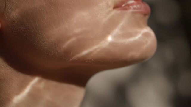 Natural skin texture illuminated by beautiful light patterns