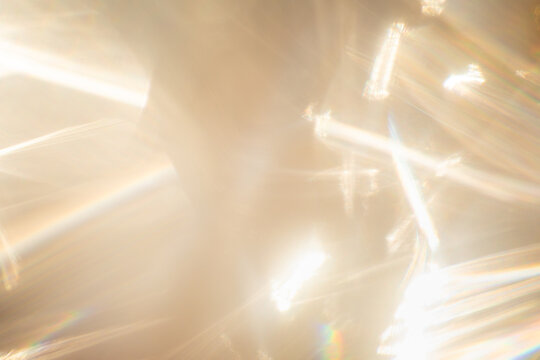 Golden light leak bokeh shimmer radiant illumination with spectrum rainbow fusion and glowing dynamic motion with layered flare and sunlight refraction.