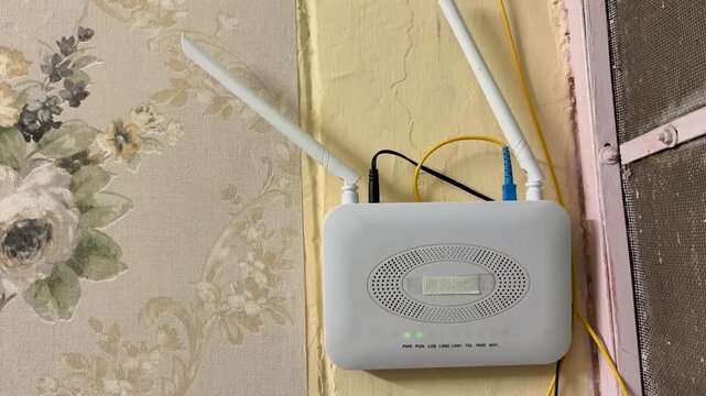 Fiber Broadband WiFi Router Installed Inside Home With Optical Cable