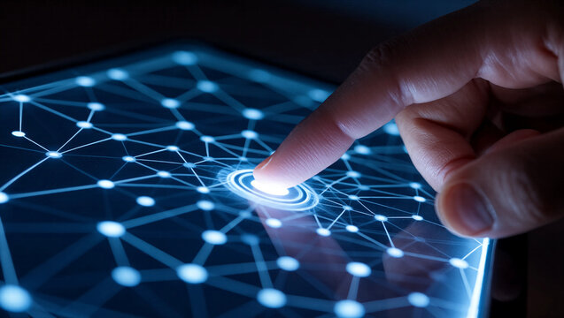 Finger touching glowing center point of complex digital network connection screen