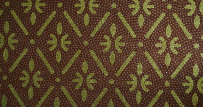 Traditional Japanese Patterns in Gold and Brown with Vertical Camera Movement - elegant traditional Japanese gold and brown patterns featuring classic geometric motifs.