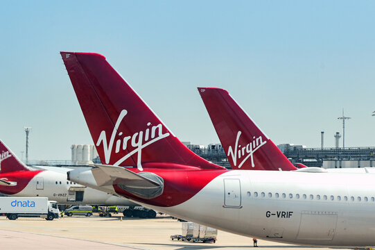 London, England, UK - 24 June 2026: Tail fins of Virgin Atlantic Airways jets at London Heathrow airport