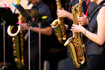 Obraz premium Street musicians performing live during a brass band concert in spain