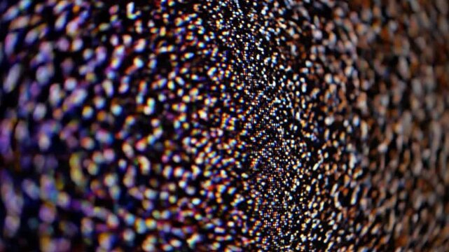 Abstract digital noise flicker on monitor screen.