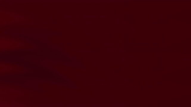 Abstract motion background with deep maroon textures