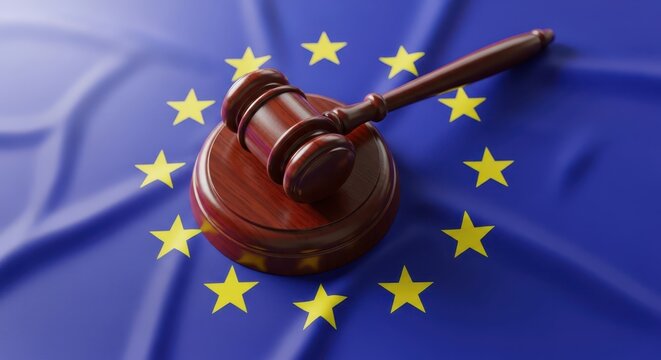 Wooden Judge Gavel on European Union Flag Background Representing EU Law and Justice System