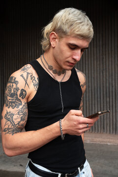 Checking smartphone in industrial urban environment