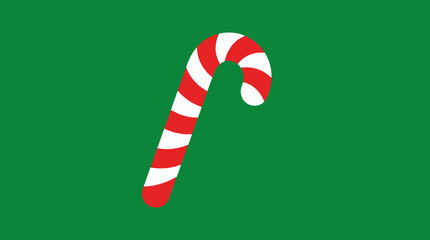 A red and white striped candy cane stands upright against a solid green background