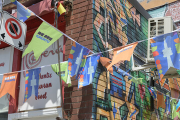 Obraz premium FIFA World Cup bunting outside Latin Taste, a Peruvian restaurant, located at 200 Baldwin St, Kensington Market, Toronto