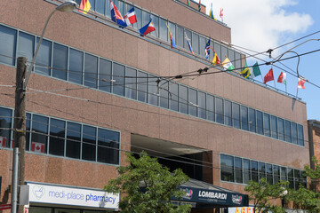 Obraz premium exterior building facade and sign of 622 College St known as the CHIN Building now the Lombardi Centre, Little Italy, Toronto