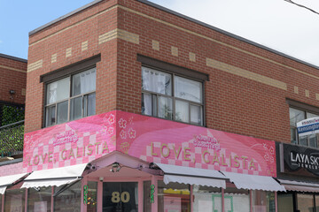 Obraz premium exterior building facade and sign of Love, Calista, a jewelry store, located at 80 Kensington Av, Toronto