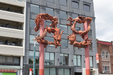 Obraz premium Millie Chen and Warren Quigley gateway/door public art installation on Spadina Av, Toronto