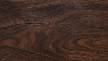 Fototapeta premium Close-up view of rich dark brown wood grain with intricate wavy patterns and natural textures, showcasing the beauty of polished timber surface.