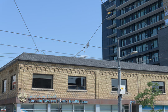 exterior building facade and sign of Toronto Western Family Health Team &ndash; Garrison Creek site located at 928 St Clair Av W