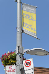 Obraz premium pole-mounted BIA banner in the Hillcrest Village (St Clair Av, Christie St, Winona Dr area), Toronto