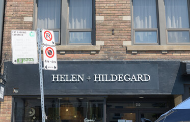 Obraz premium exterior building facade and sign of HELEN + HILDEGARD, a tea store, located at 780 St Clair Av W, Toronto