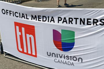 Obraz premium tln, univision canada media partner banner at Salsa on St Clair, Toronto (morning, 11 July 2026)