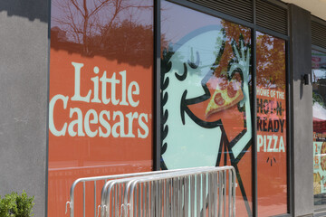 Obraz premium exterior building and sign of Little Caesars Pizza located at 840 St Clair Av W, Toronto