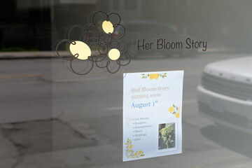 Obraz premium paper poster inside a shop window, the future location of 